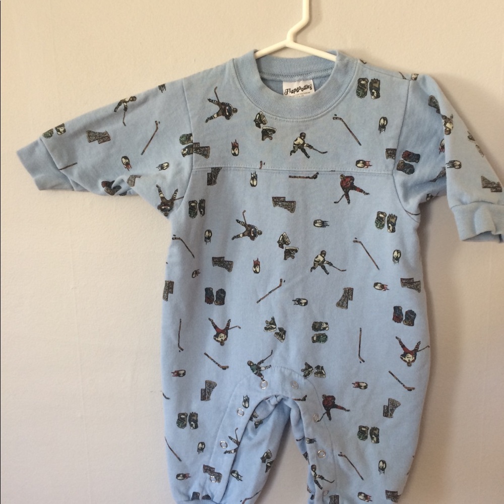 Flap doodles blue  hockey print onesie. 12 mo